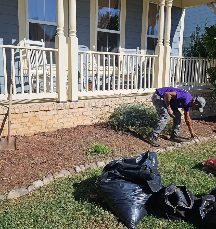 Sisters With A Mower family crew tending a residential yard